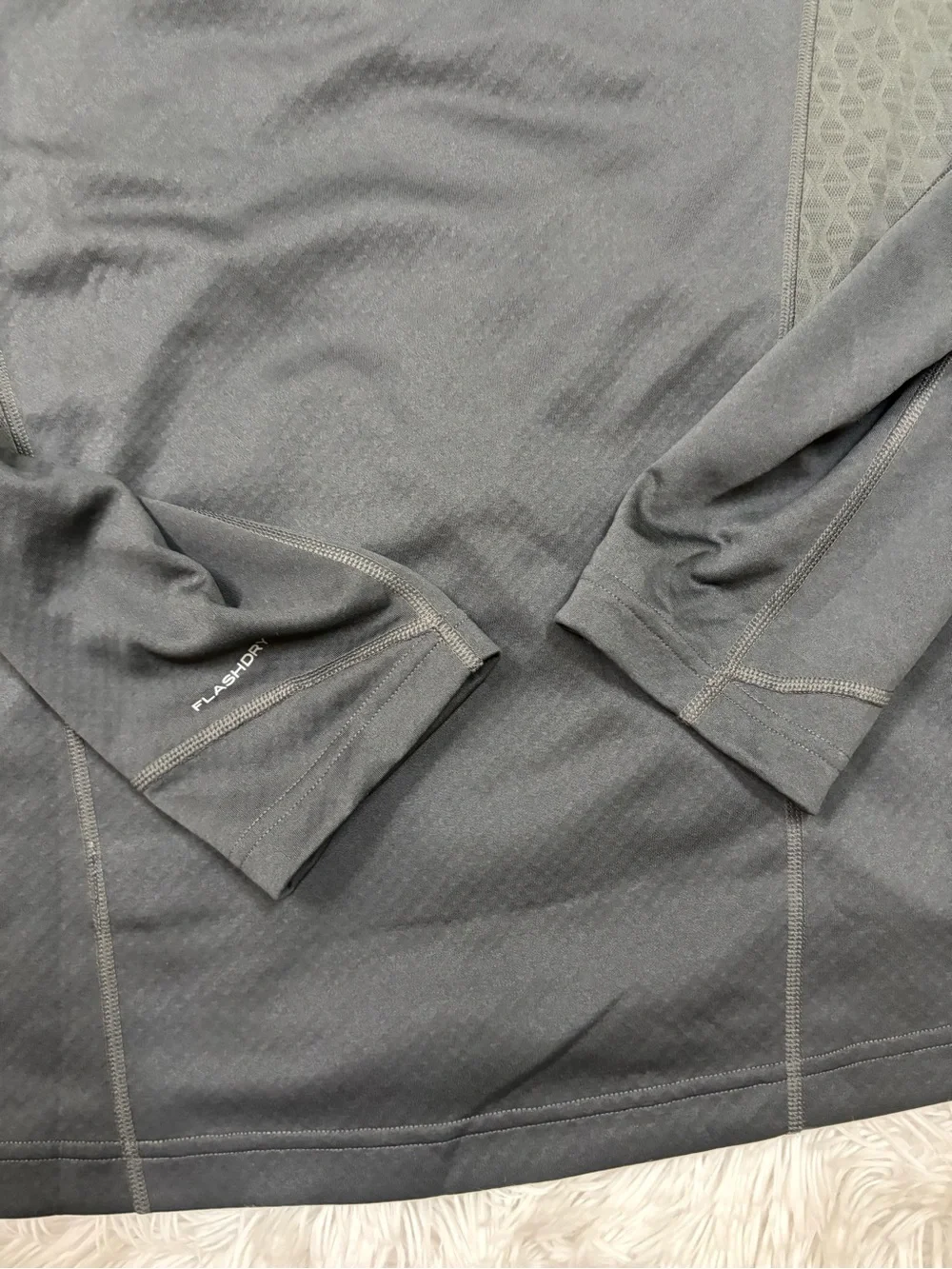 The North Face Black Half-Zip Performance Top with Gold Logo